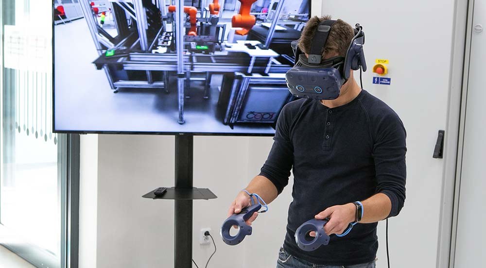 Operator using a virtual reality headset at Smart Factory