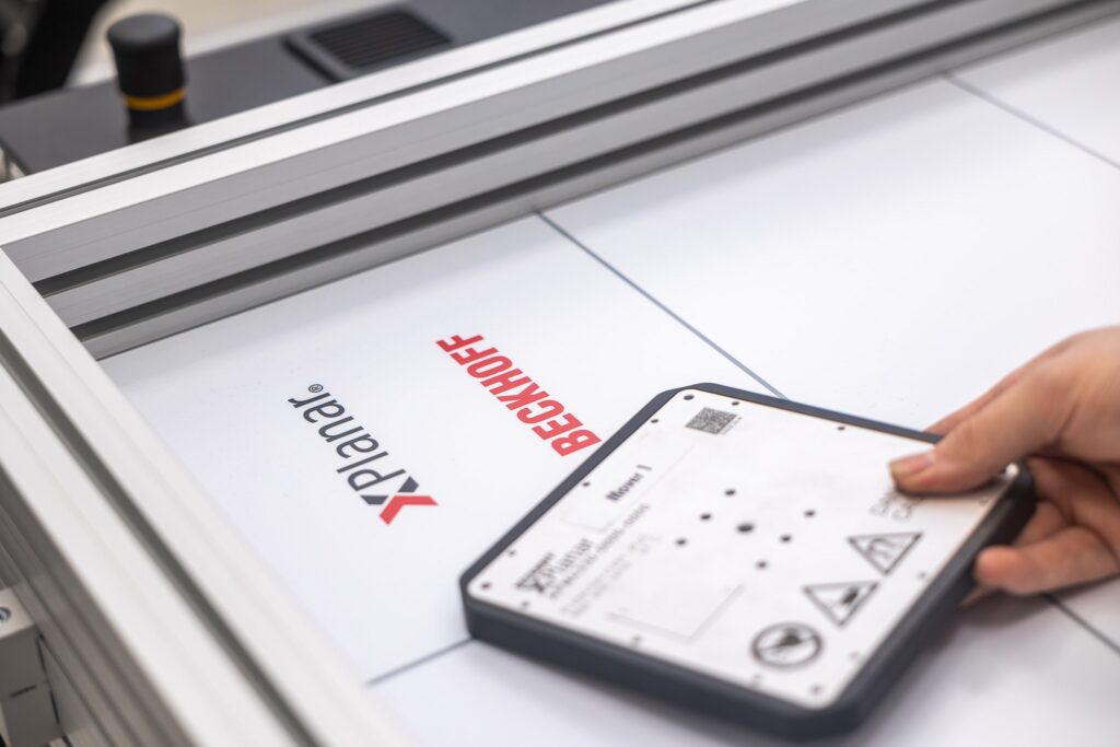 Smart Factory operator using an industrial control panel